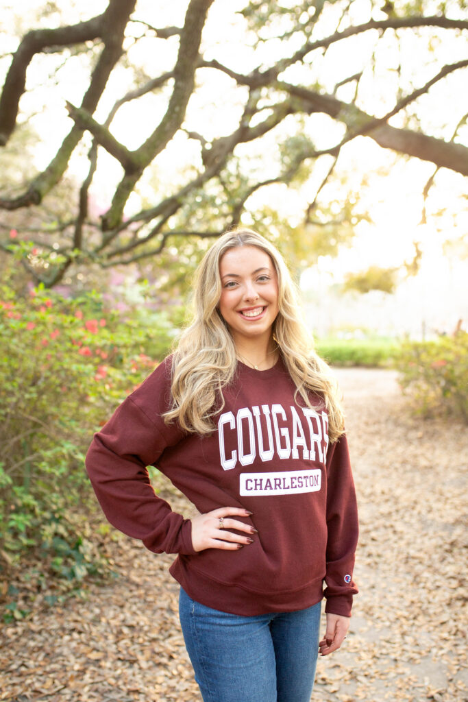 Charleston Senior Photographer capturing high school senior under Spanish Moss at Hampton Park