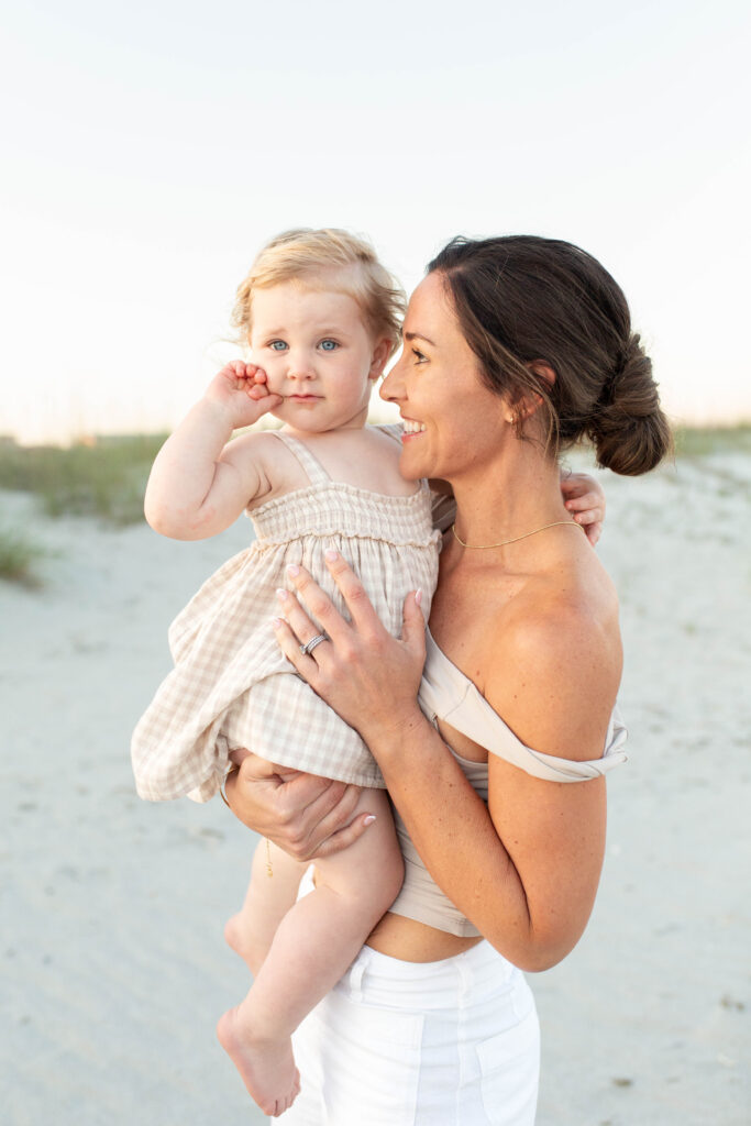 Mother and baby on the beach during an extended family photo session