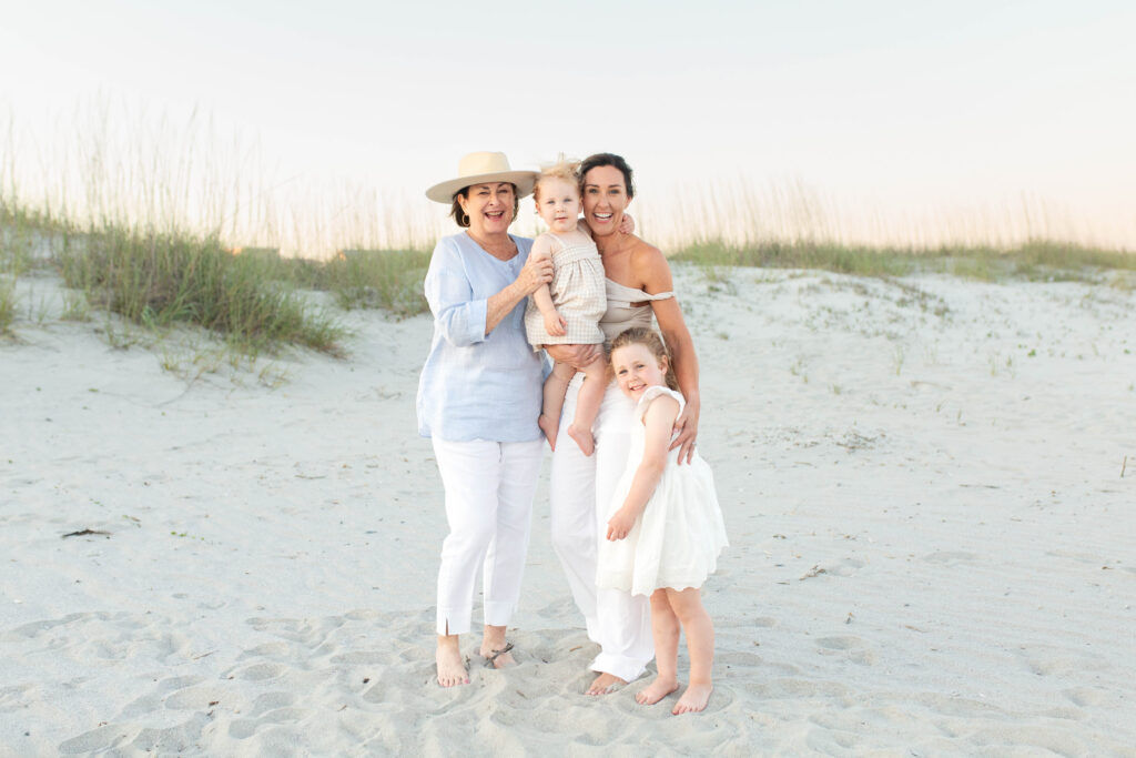 Three generations of ladies on the beach