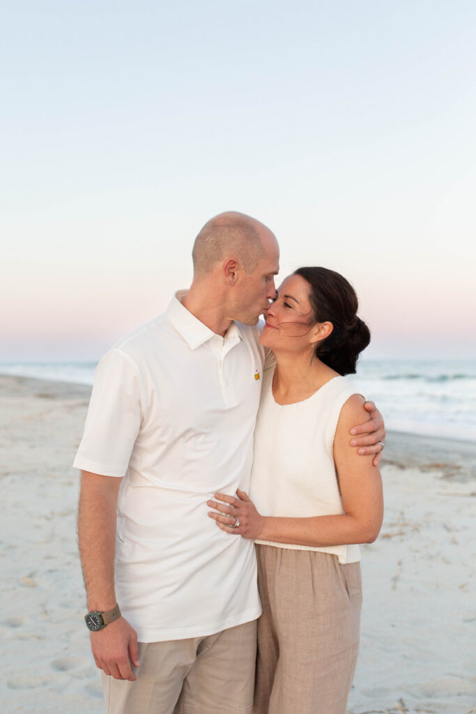 Individual couple's portrait taken on the beach during an extended family photo session