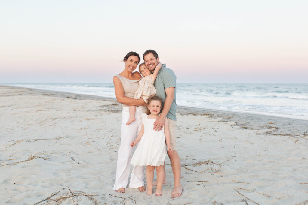 individual family photos taken on the beach during an extended family session