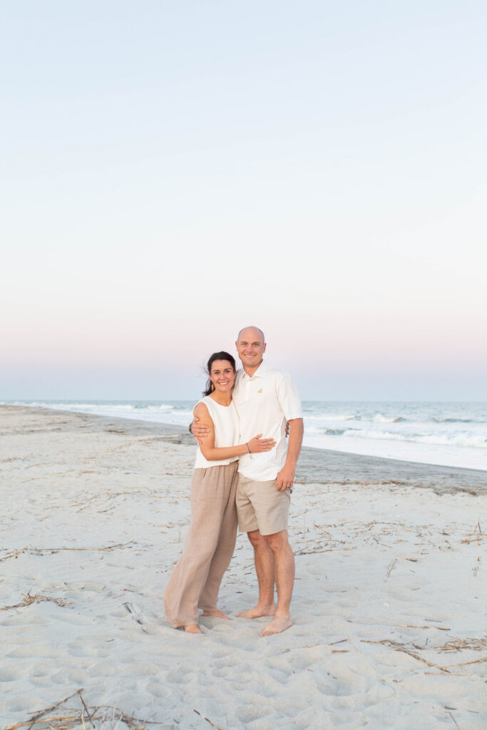 Individual couple's portrait taken on the beach during an extended family photo session